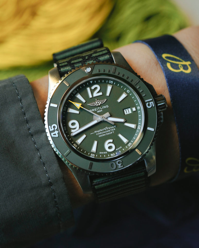 Close-up wrist shot of the Breitling x Outerknown Superocean watch